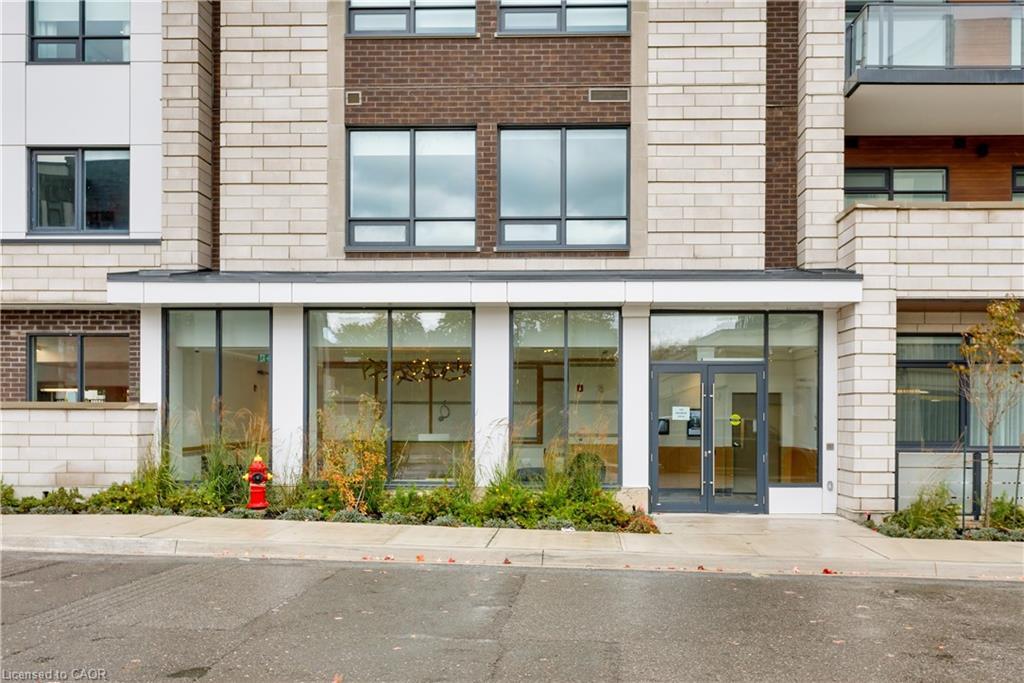 307-123 Maurice Drive, Oakville, ON - Outdoor With Facade