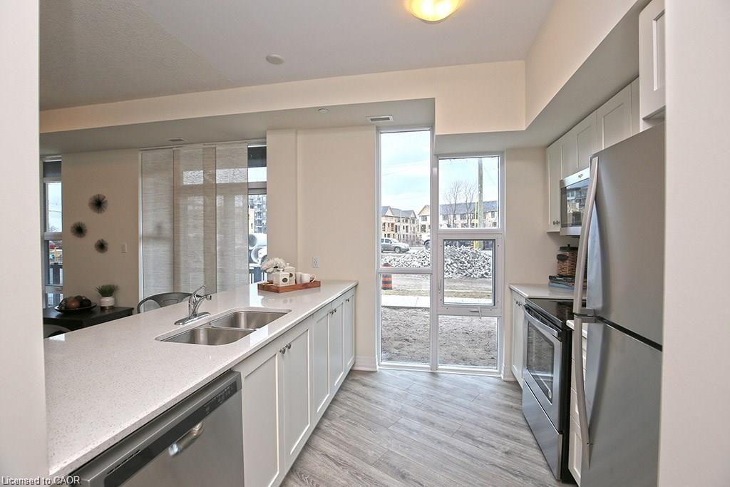 108-10 Concord Place, Grimsby, ON - Indoor Photo Showing Kitchen With Double Sink