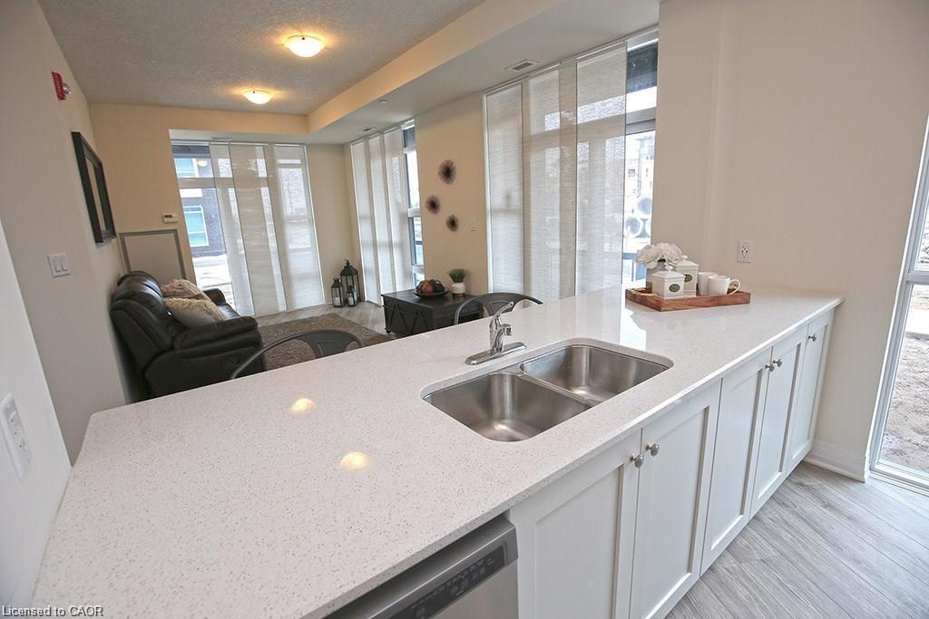 108-10 Concord Place, Grimsby, ON - Indoor Photo Showing Kitchen With Double Sink