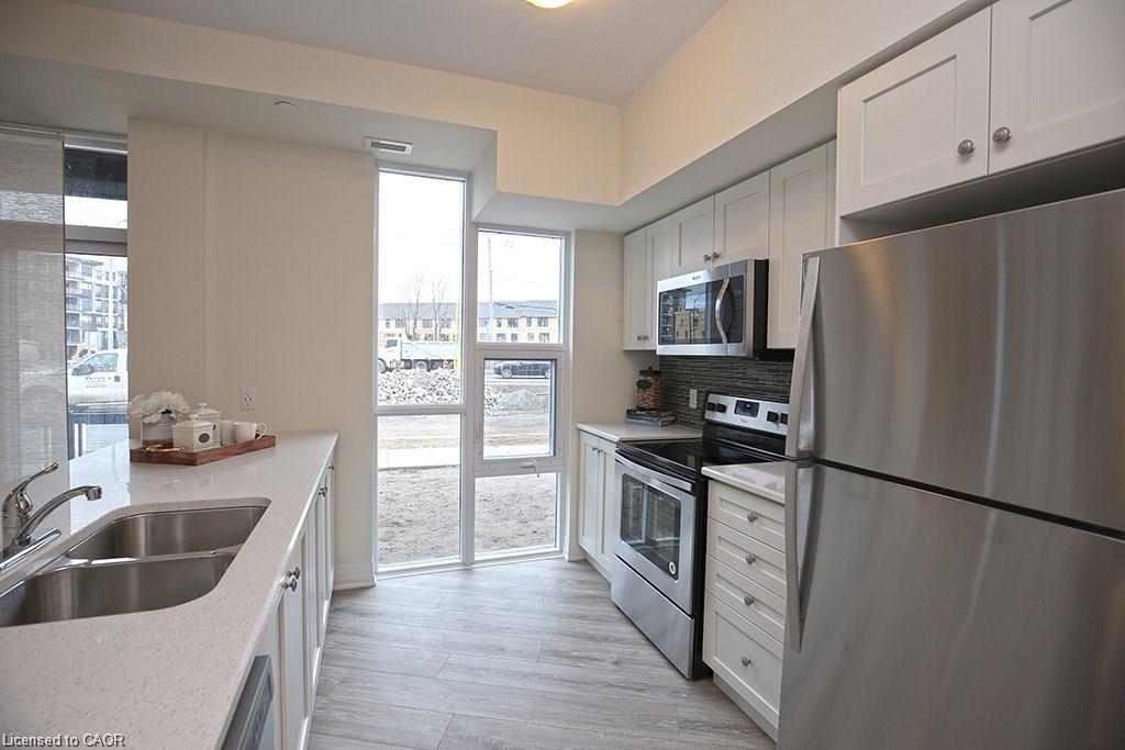 108-10 Concord Place, Grimsby, ON - Indoor Photo Showing Kitchen With Double Sink