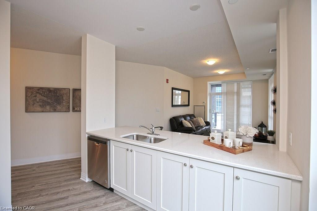 108-10 Concord Place, Grimsby, ON - Indoor Photo Showing Kitchen With Double Sink