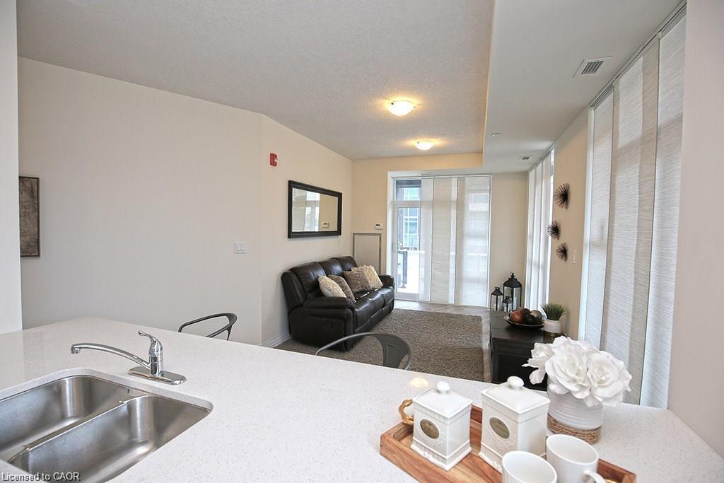 108-10 Concord Place, Grimsby, ON - Indoor Photo Showing Kitchen With Double Sink