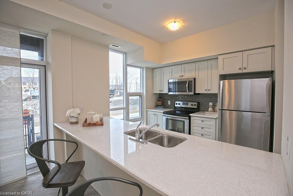 108-10 Concord Place, Grimsby, ON - Indoor Photo Showing Kitchen With Double Sink With Upgraded Kitchen