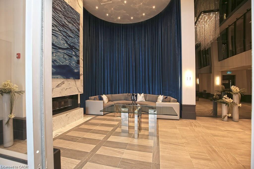 108-10 Concord Place, Grimsby, ON - Indoor Photo Showing Other Room With Fireplace