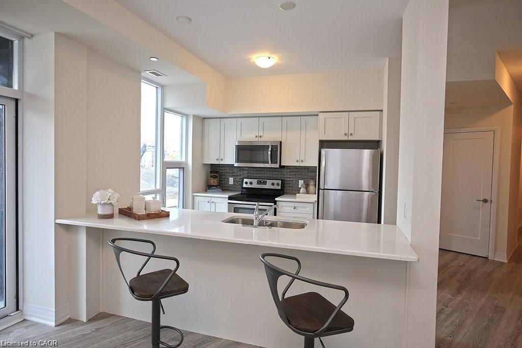 108-10 Concord Place, Grimsby, ON - Indoor Photo Showing Kitchen With Double Sink
