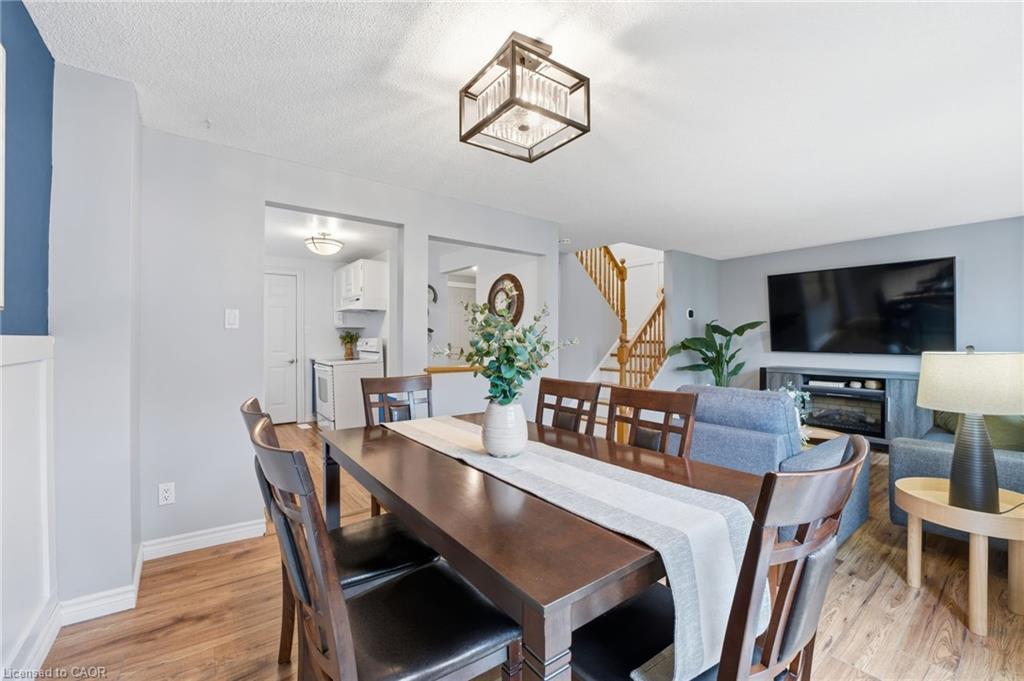 510B Rosemeadow Crescent, Waterloo, ON - Indoor Photo Showing Dining Room With Fireplace
