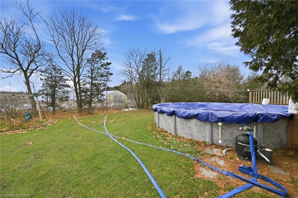 8520 Sixteen Road, Caistor Centre, ON - Outdoor With Above Ground Pool