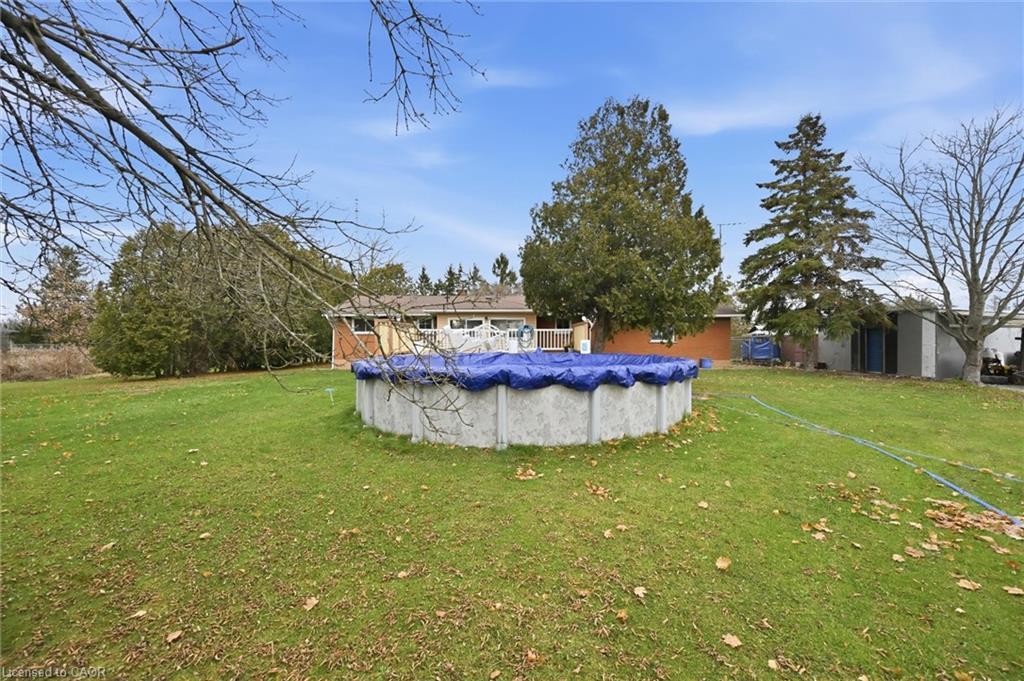 8520 Sixteen Road, Caistor Centre, ON - Outdoor With Above Ground Pool With Backyard