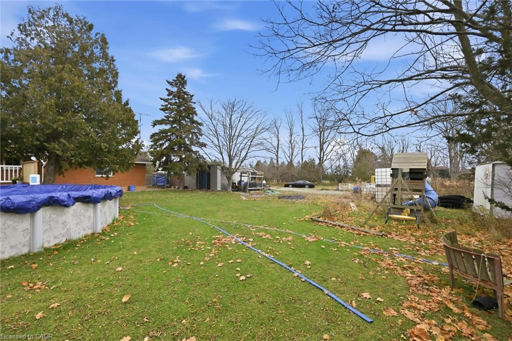 8520 Sixteen Road, Caistor Centre, ON - Outdoor With Above Ground Pool