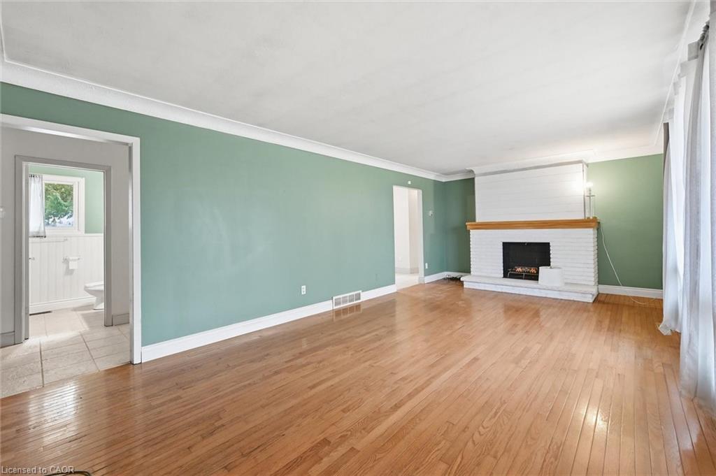 8520 Sixteen Road, Caistor Centre, ON - Indoor Photo Showing Living Room With Fireplace