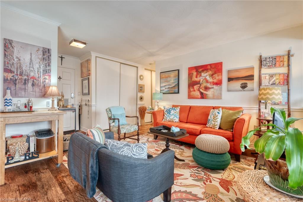106-107 St. Josephs Drive, Hamilton, ON - Indoor Photo Showing Living Room With Fireplace