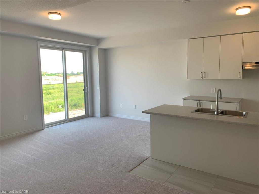 88 Edminston Drive, Centre Wellington, ON - Indoor Photo Showing Kitchen With Double Sink
