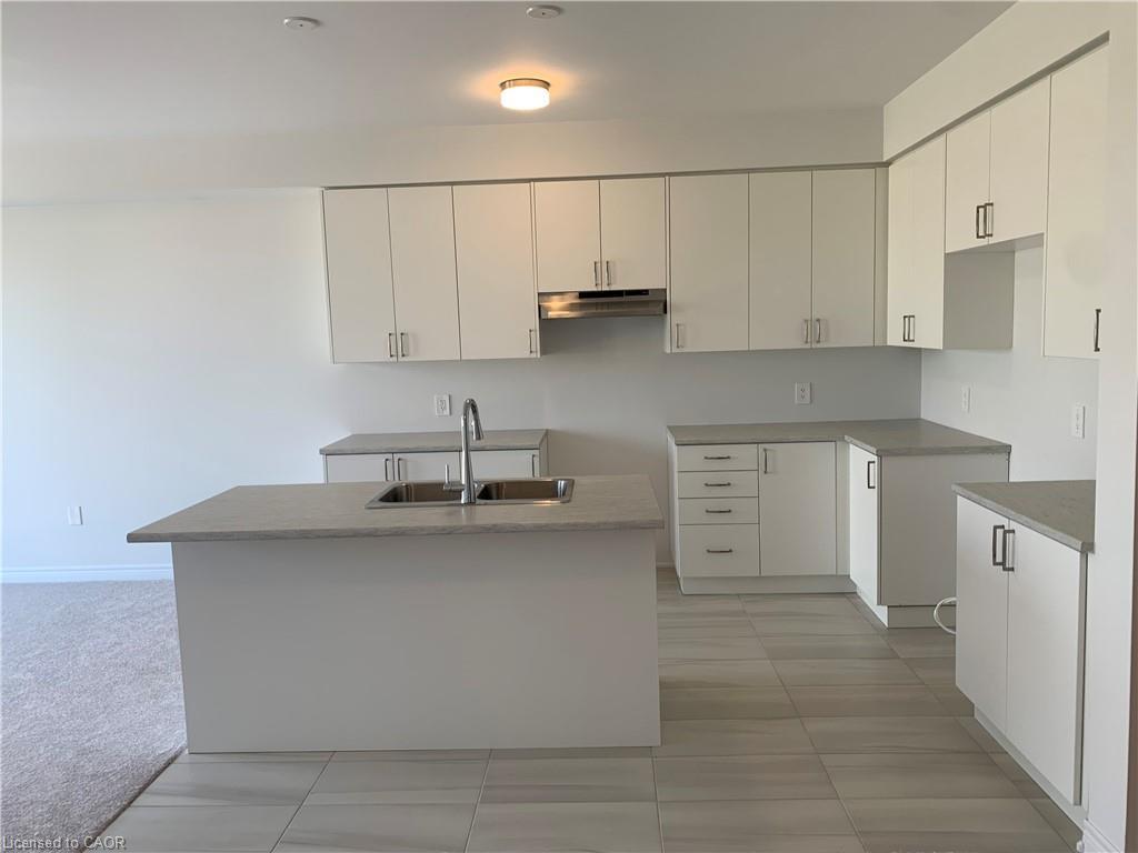 88 Edminston Drive, Centre Wellington, ON - Indoor Photo Showing Kitchen With Double Sink