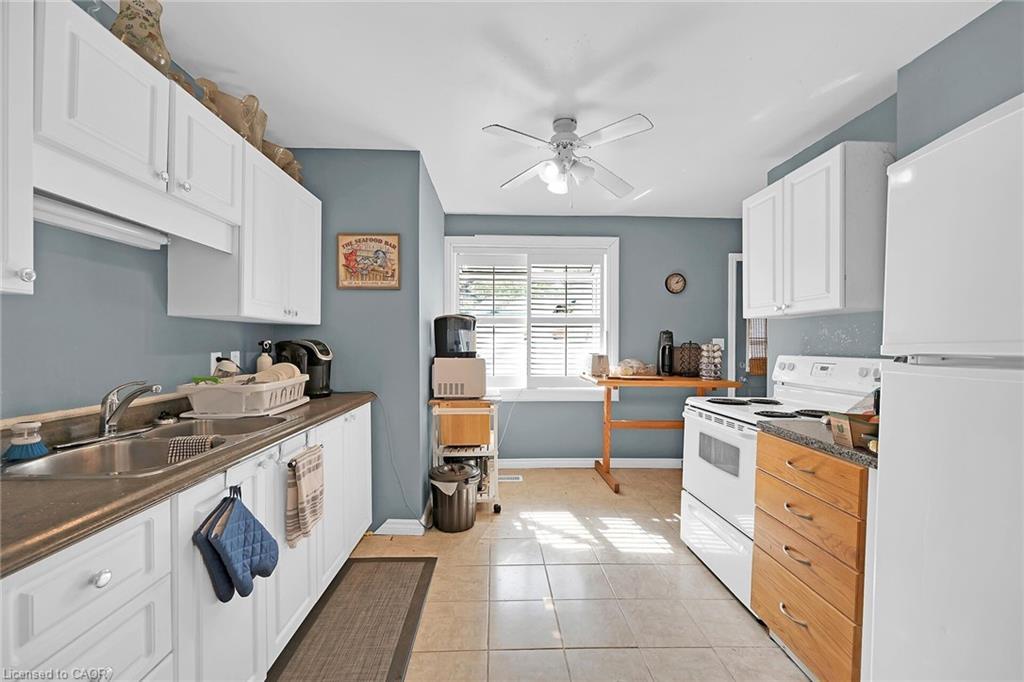 942 Upper Gage Avenue, Hamilton, ON - Indoor Photo Showing Kitchen With Double Sink