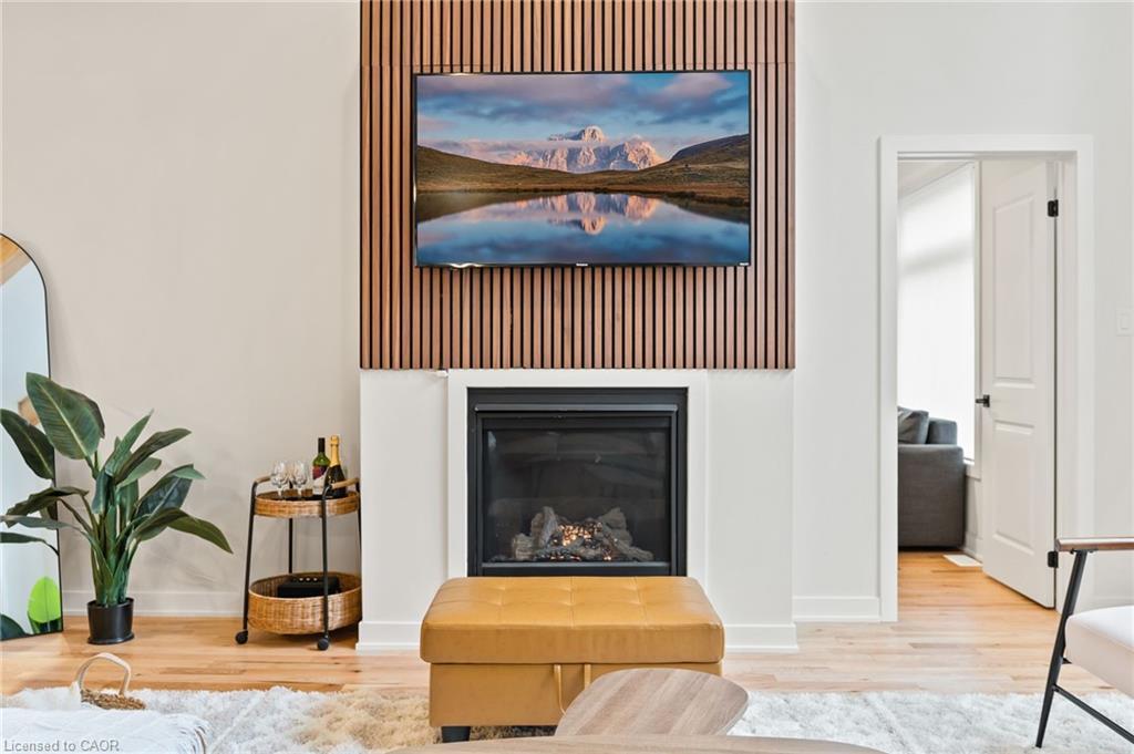 1049 Greensview Drive, Huntsville, ON - Indoor Photo Showing Living Room With Fireplace