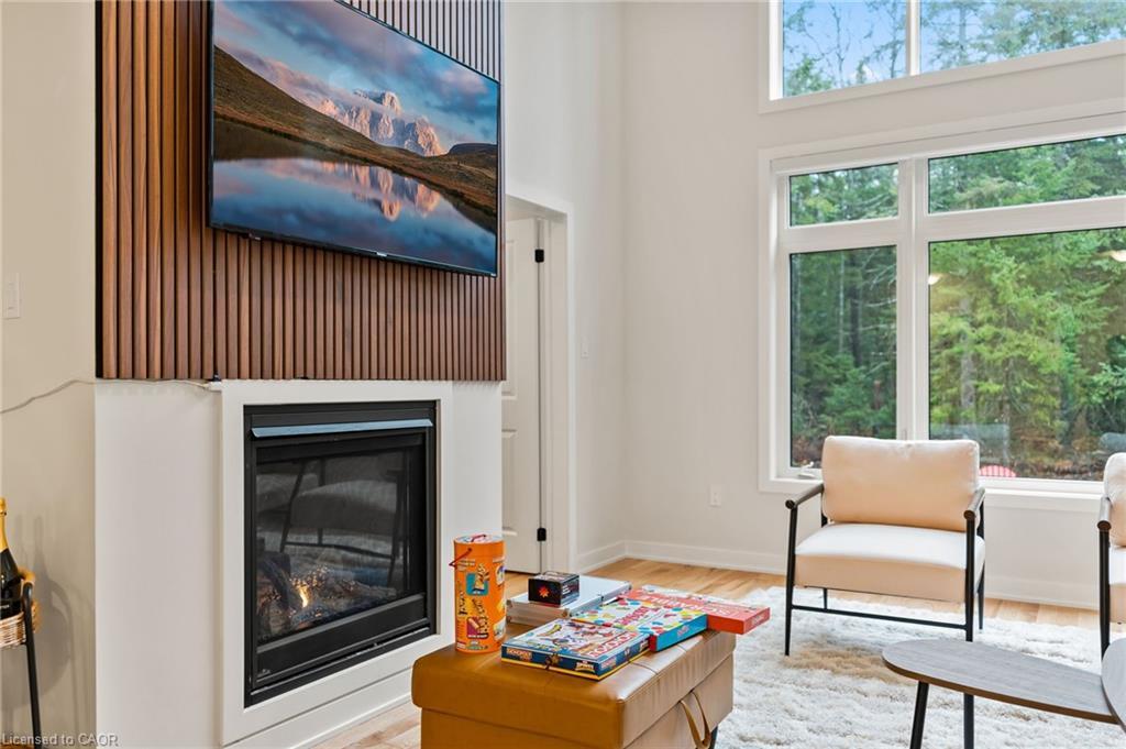 1049 Greensview Drive, Huntsville, ON - Indoor Photo Showing Living Room With Fireplace