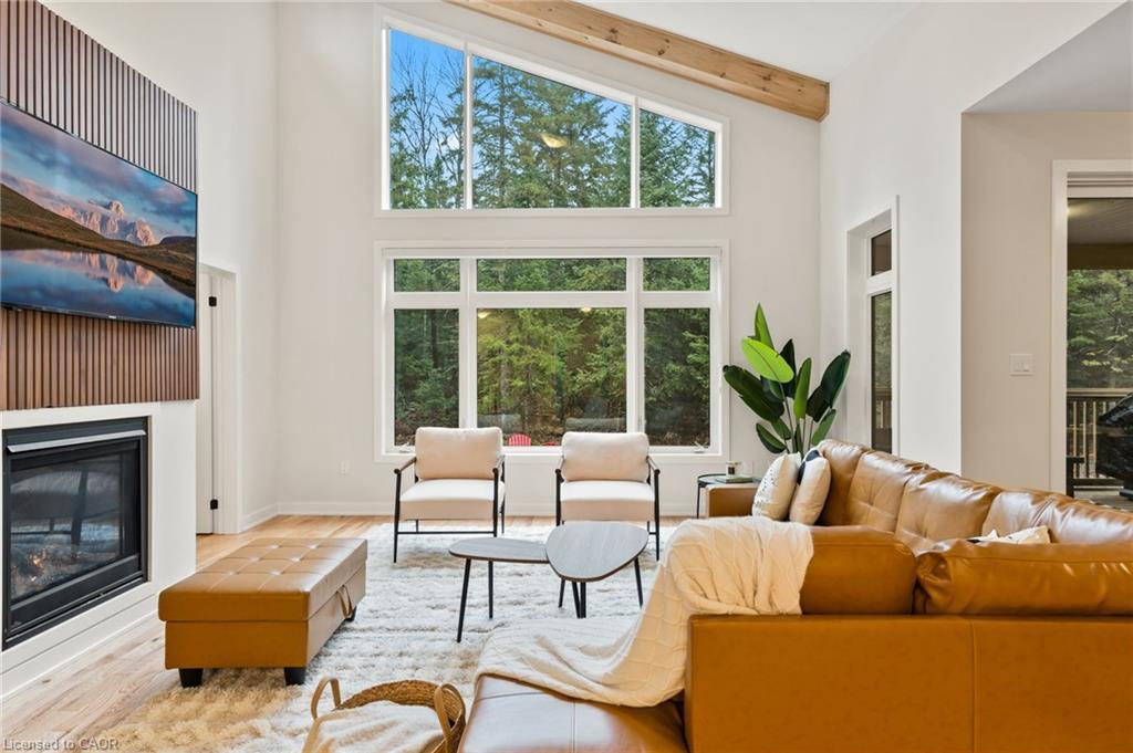 1049 Greensview Drive, Huntsville, ON - Indoor Photo Showing Living Room With Fireplace