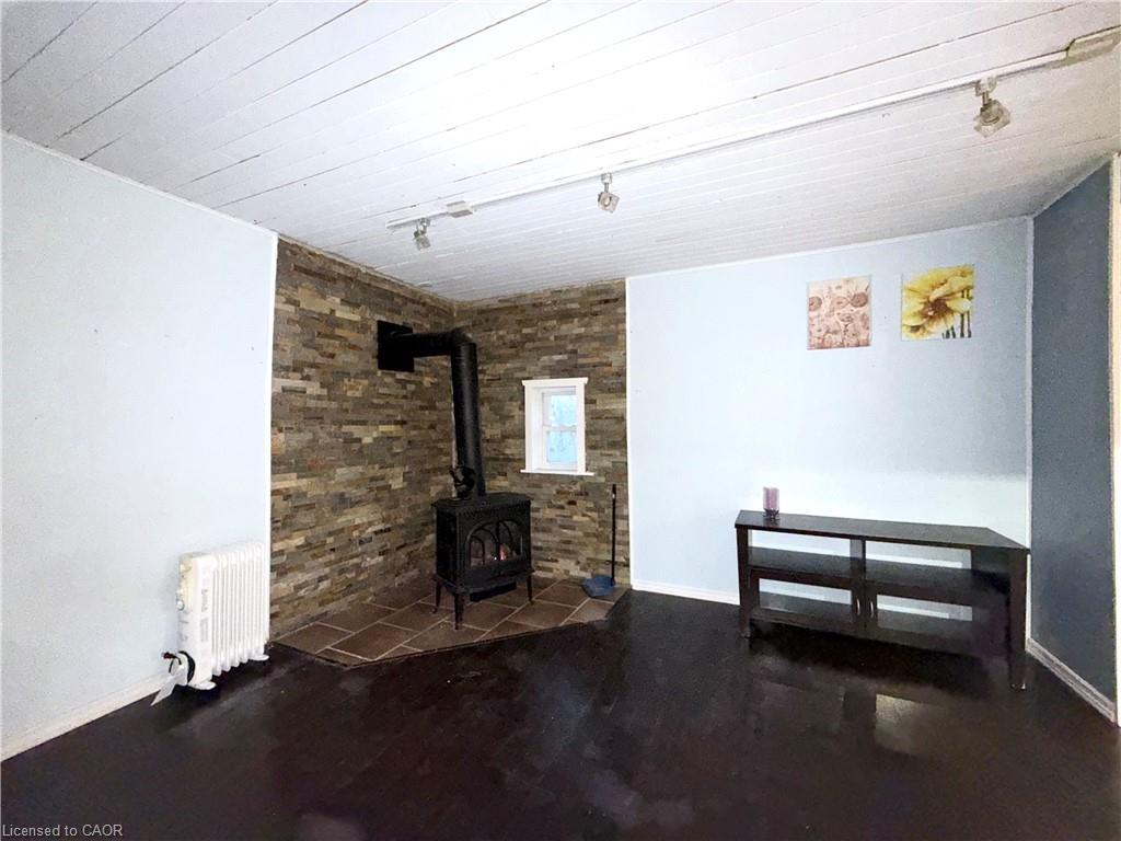 Side-401 Queenston Street, St. Catharines, ON - Photo Showing Other Room With Fireplace