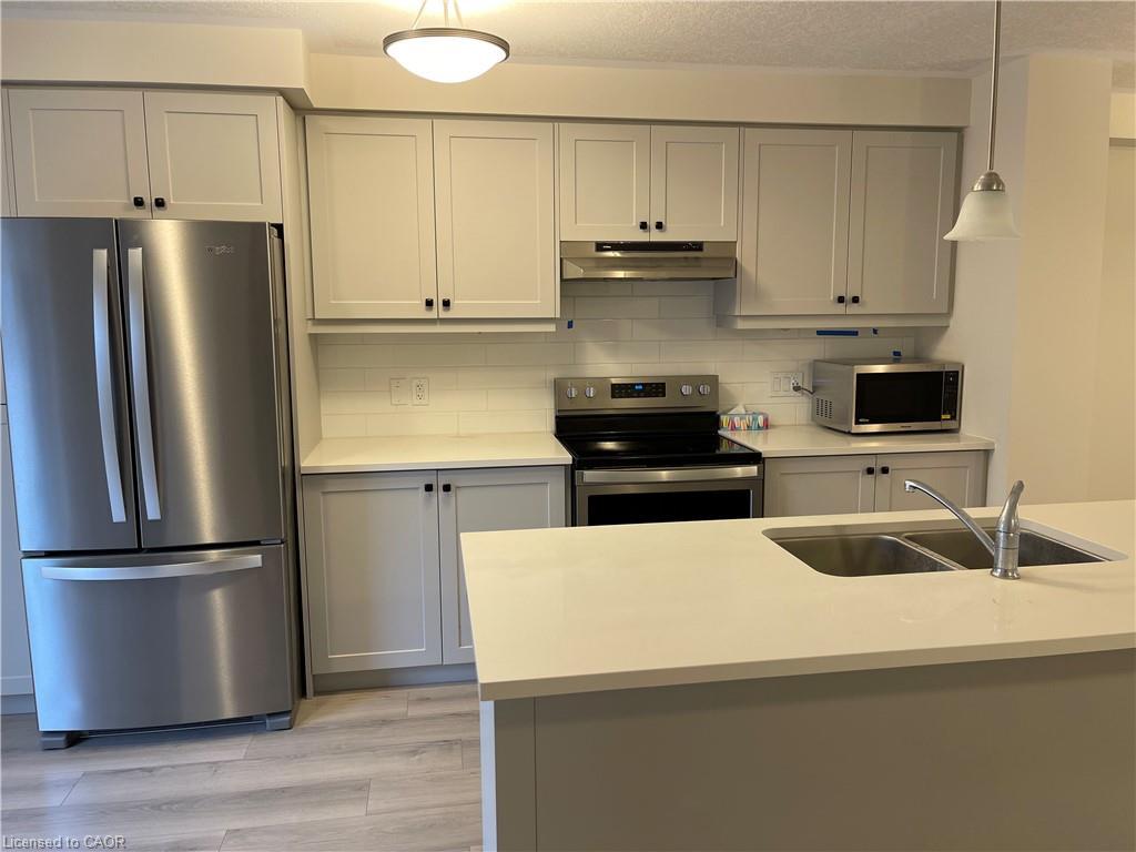 3-311 Woolwich Street, Waterloo, ON - Indoor Photo Showing Kitchen With Double Sink