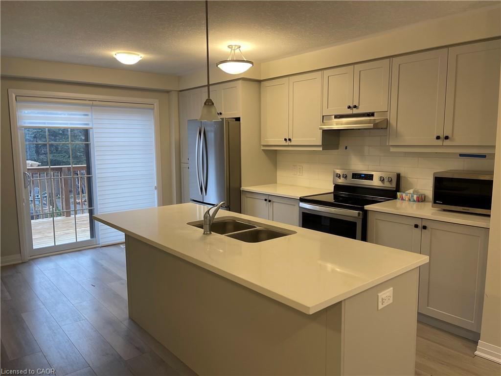 3-311 Woolwich Street, Waterloo, ON - Indoor Photo Showing Kitchen With Double Sink