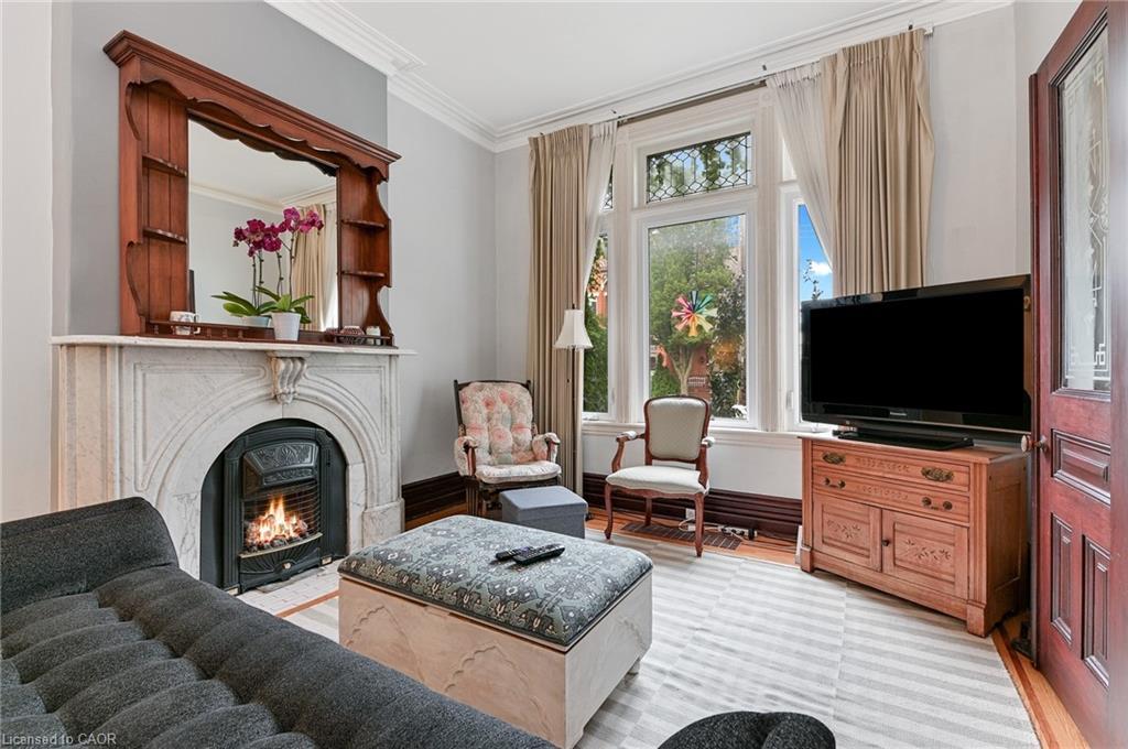 30 Ontario Avenue, Hamilton, ON - Indoor Photo Showing Living Room With Fireplace