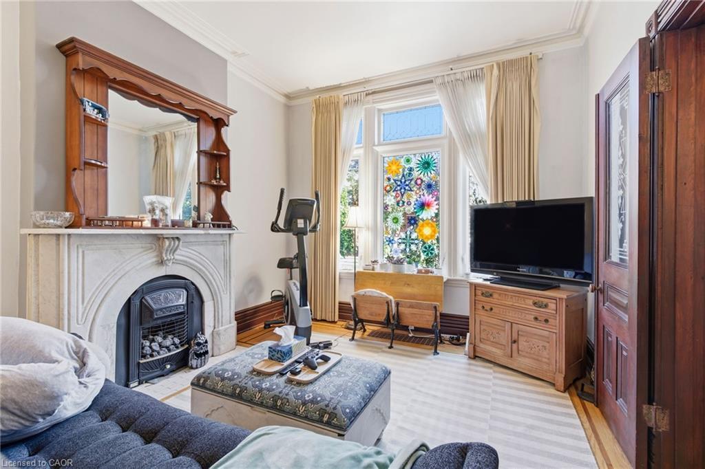 30 Ontario Avenue, Hamilton, ON - Indoor Photo Showing Living Room With Fireplace