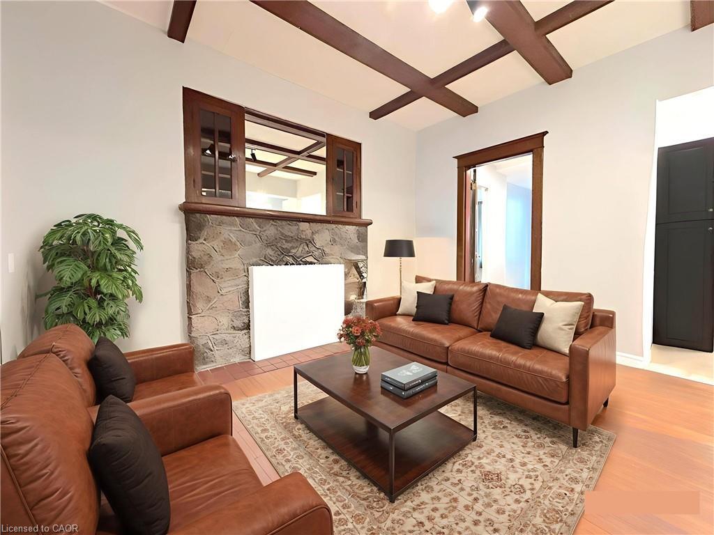 1-24 Burris Street, Hamilton, ON - Indoor Photo Showing Living Room With Fireplace
