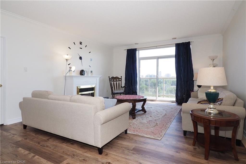 701-255 Keats Way, Waterloo, ON - Indoor Photo Showing Living Room With Fireplace