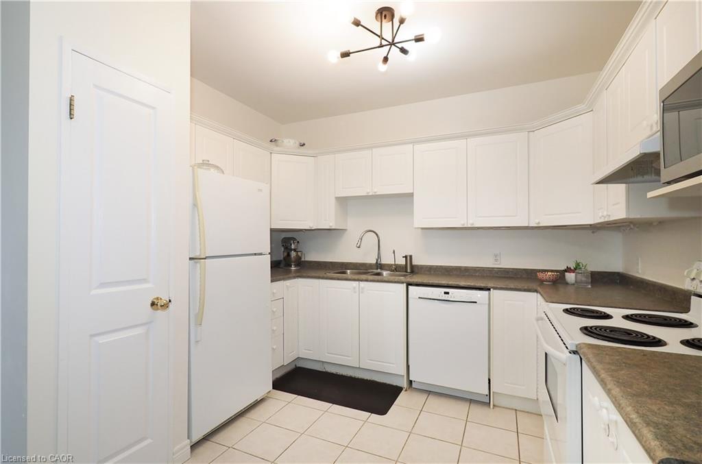 701-255 Keats Way, Waterloo, ON - Indoor Photo Showing Kitchen With Double Sink