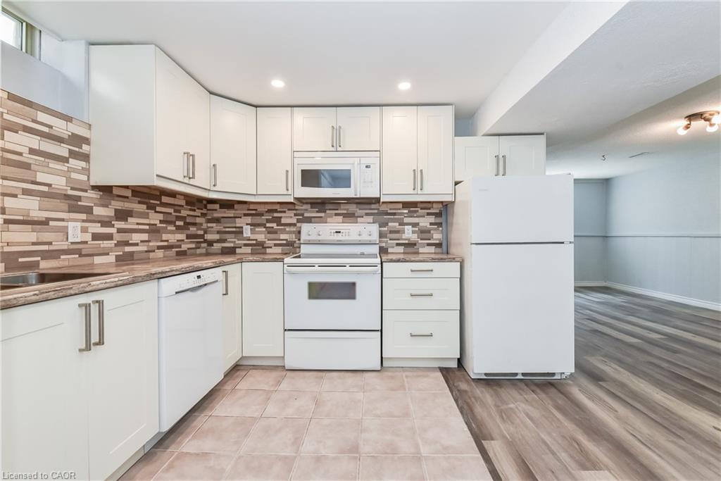 Lower-128 Carlyle Drive, Kitchener, ON - Indoor Photo Showing Kitchen With Double Sink