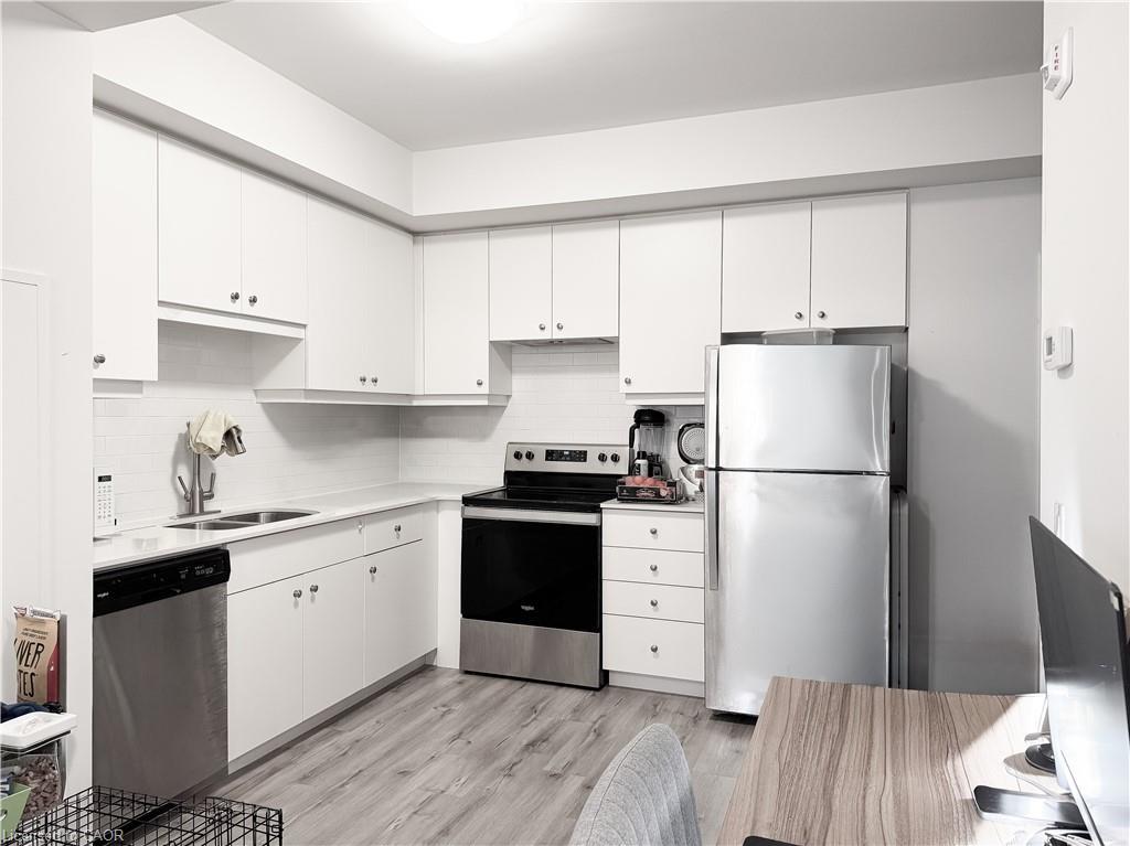 504-251 Northfield Drive E, Waterloo, ON - Indoor Photo Showing Kitchen With Double Sink