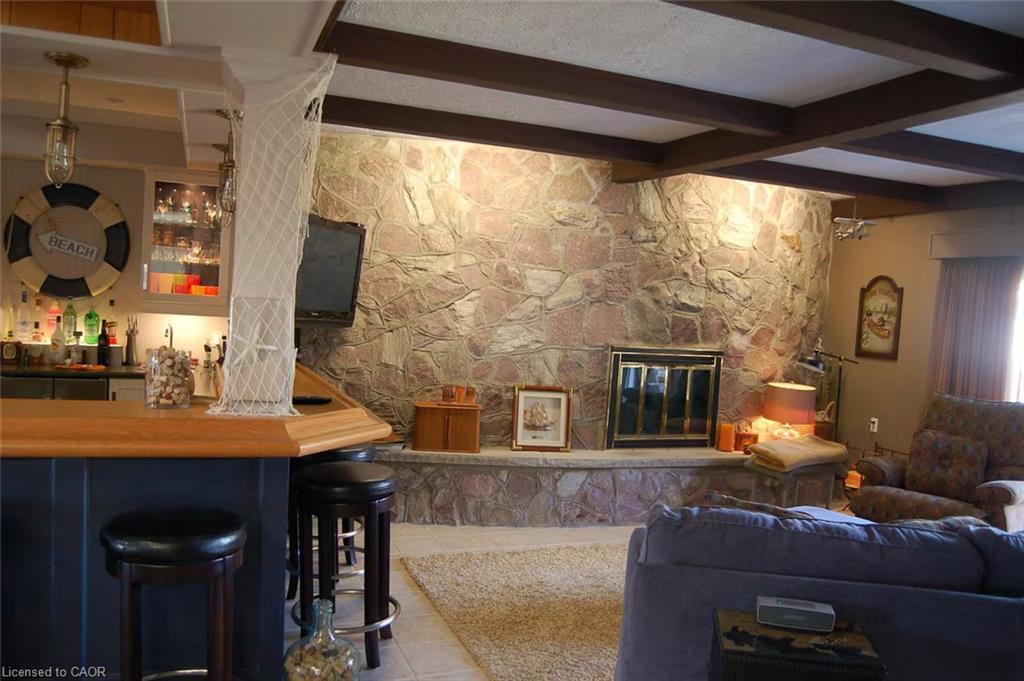 109 Ordnance Avenue, Turkey Point, ON - Indoor With Fireplace