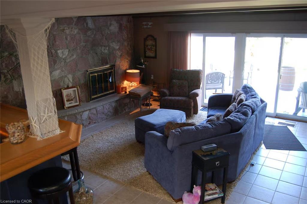 109 Ordnance Avenue, Turkey Point, ON - Indoor Photo Showing Living Room With Fireplace