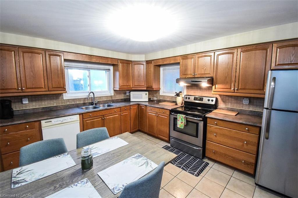 16 Land Street N, Hamilton, ON - Indoor Photo Showing Kitchen With Double Sink
