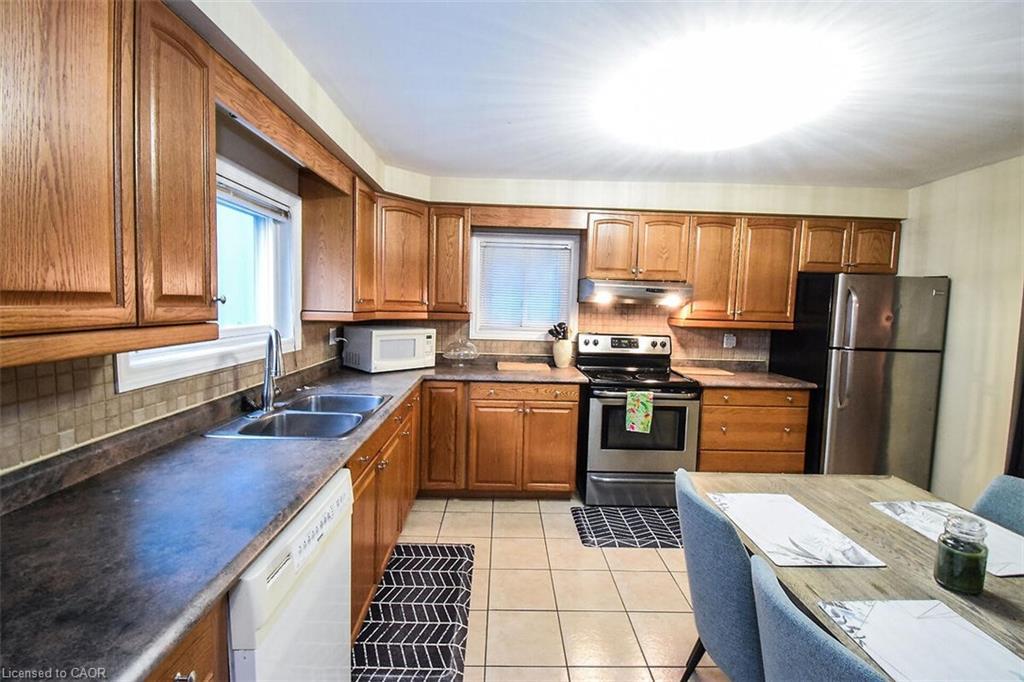 16 Land Street N, Hamilton, ON - Indoor Photo Showing Kitchen With Double Sink