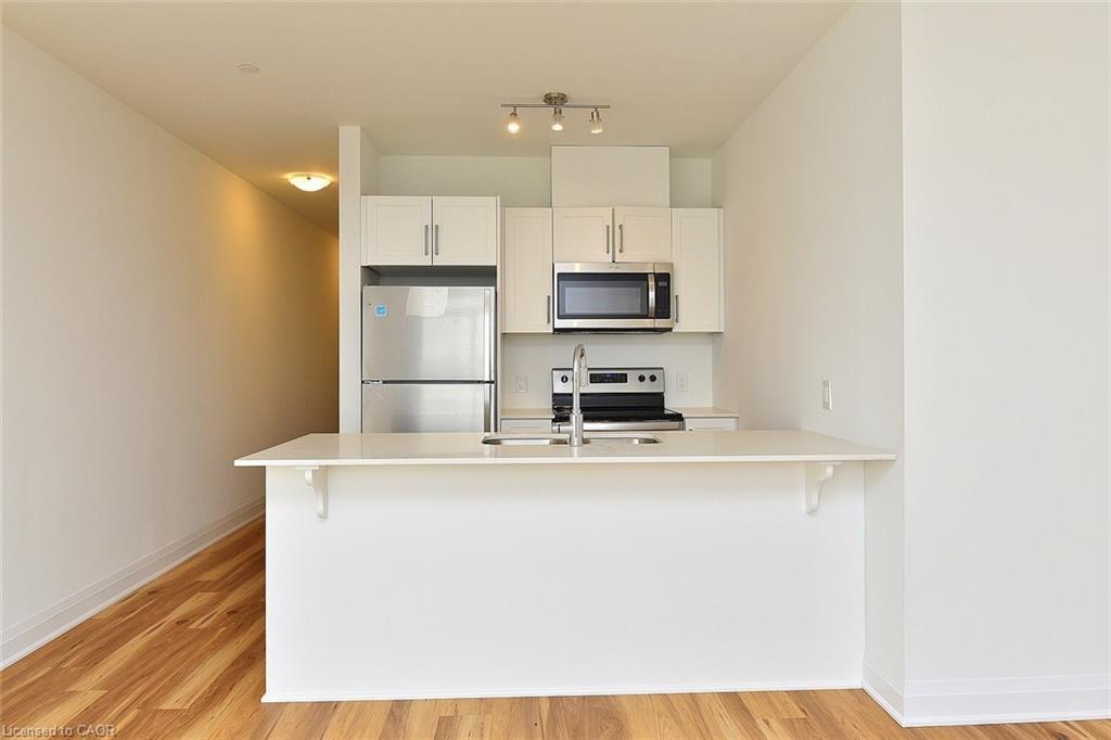 219-1936 Rymal Road E, Hamilton, ON - Indoor Photo Showing Kitchen With Double Sink