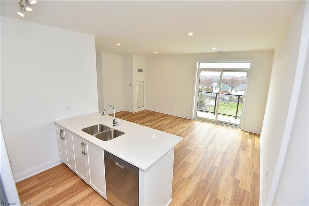 219-1936 Rymal Road E, Hamilton, ON - Indoor Photo Showing Kitchen With Double Sink
