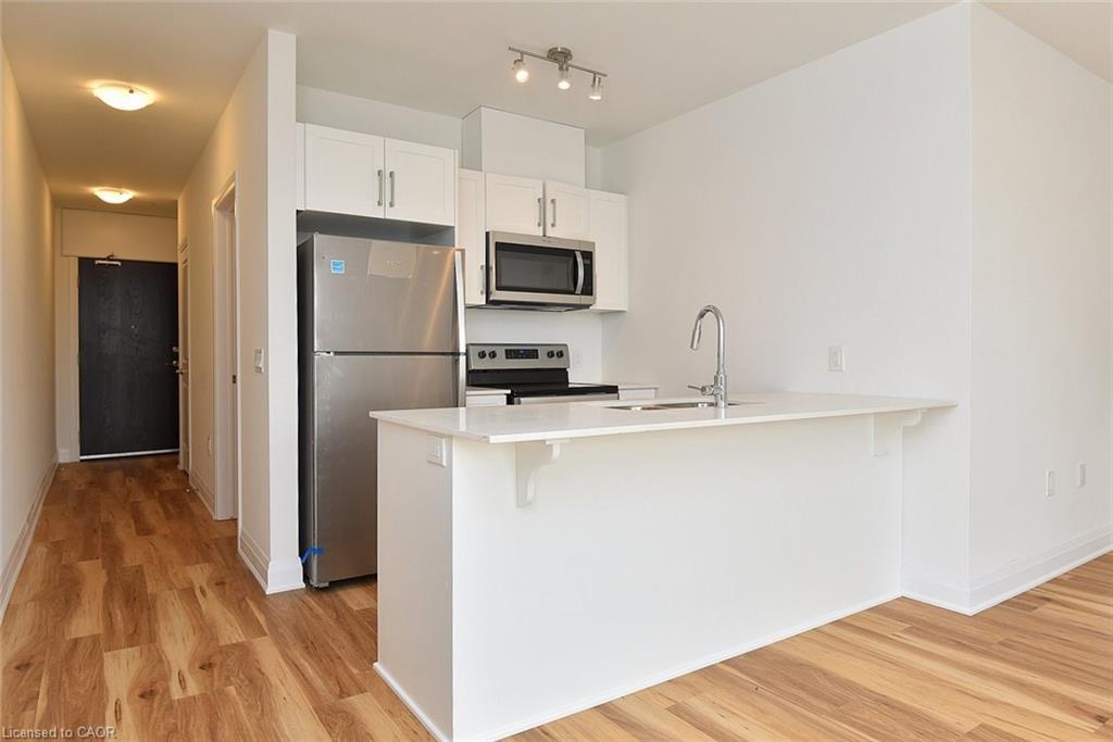 219-1936 Rymal Road E, Hamilton, ON - Indoor Photo Showing Kitchen With Stainless Steel Kitchen