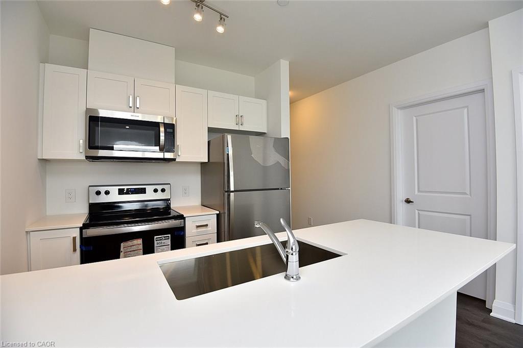 510-1936 Rymal Road E, Hamilton, ON - Indoor Photo Showing Kitchen With Stainless Steel Kitchen With Double Sink