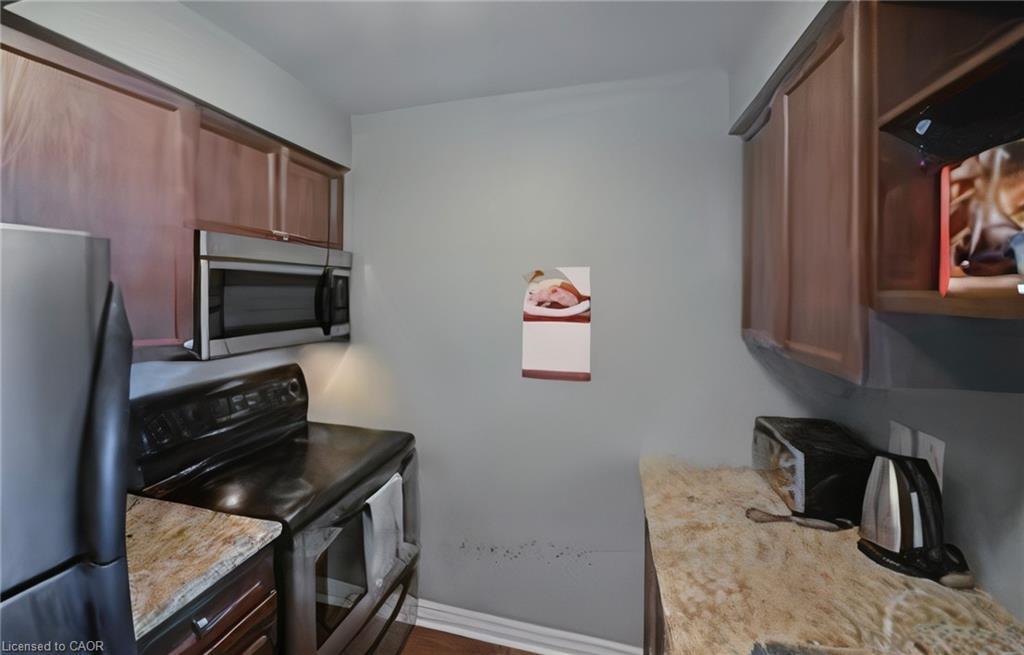707-2379 Central Park Drive, Oakville, ON - Indoor Photo Showing Kitchen