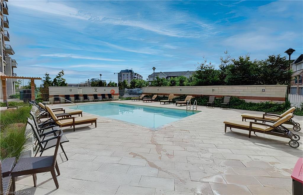 707-2379 Central Park Drive, Oakville, ON - Outdoor With In Ground Pool