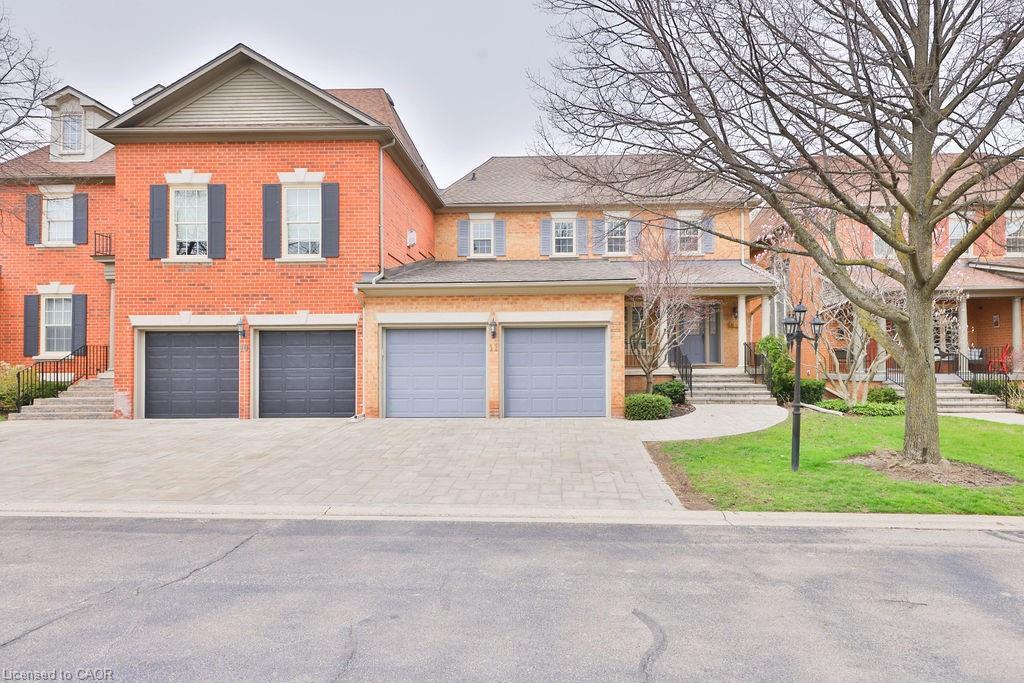 11-4211 Millcroft Park Drive, Burlington, ON - Outdoor With Facade