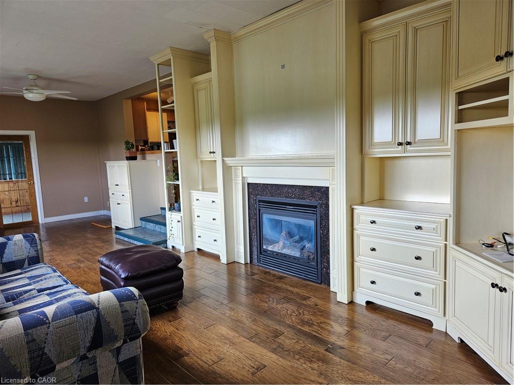 Main House-65 Erie Avenue N, Fisherville, ON - Indoor Photo Showing Living Room With Fireplace