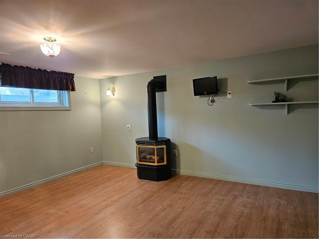 Main House-65 Erie Avenue N, Fisherville, ON - Indoor Photo Showing Other Room With Fireplace