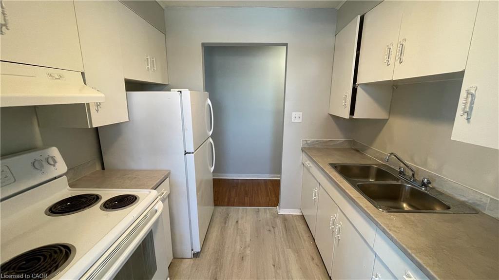 9-15 Empire Street, Welland, ON - Indoor Photo Showing Kitchen With Double Sink