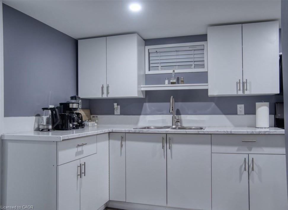 B-651 Upper Ottawa Street, Hamilton, ON - Indoor Photo Showing Kitchen With Double Sink