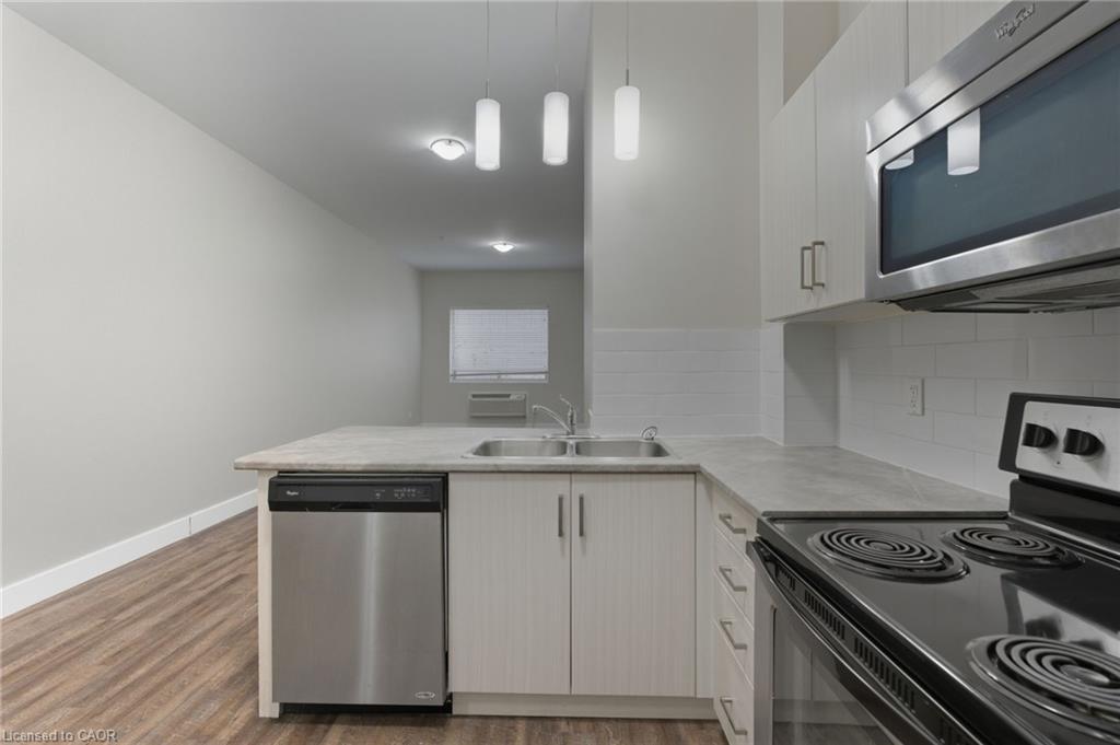 101-149 Main Street W, Hamilton, ON - Indoor Photo Showing Kitchen With Double Sink