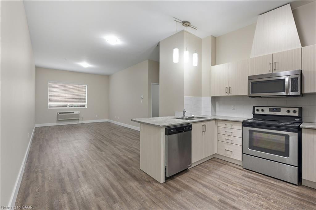 101-149 Main Street W, Hamilton, ON - Indoor Photo Showing Kitchen With Stainless Steel Kitchen With Double Sink