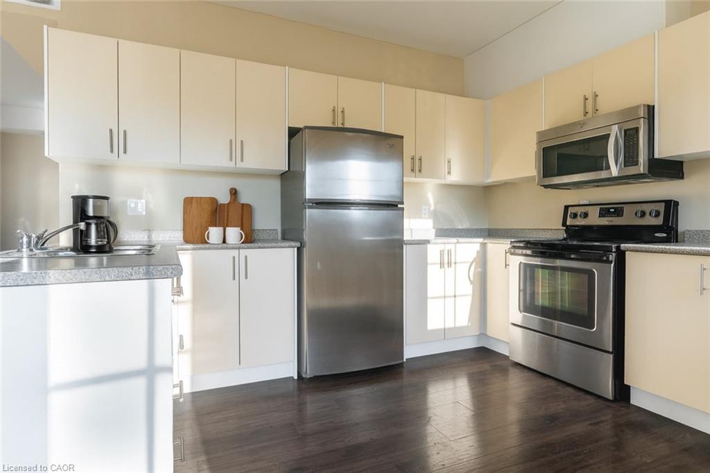 304-174 Bronte Street S, Milton, ON - Indoor Photo Showing Kitchen With Double Sink