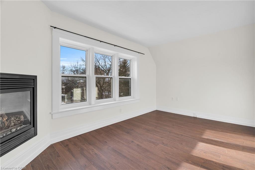 D (Upper)-98 Church Street, Kitchener, ON - Indoor With Fireplace